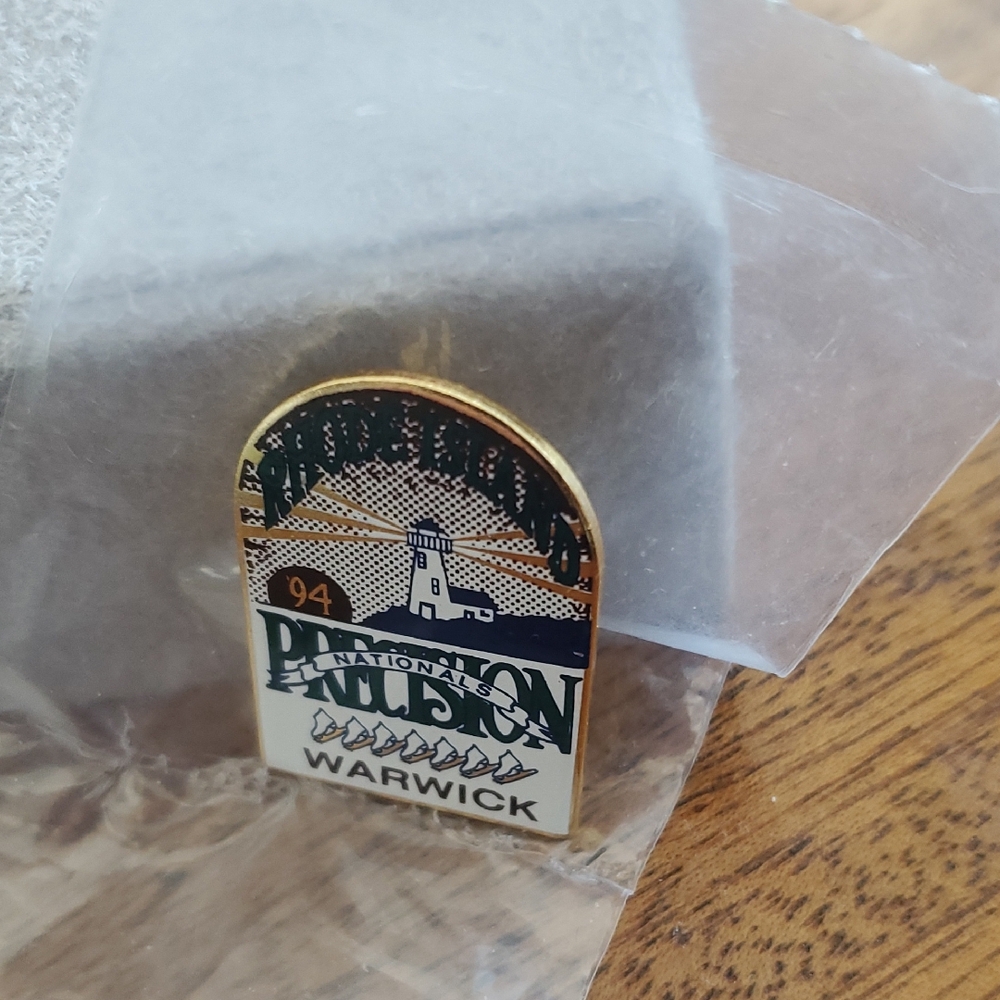 National Syncro Pin - Gold and Green. Pin Like New.Location: WARWICK RI.